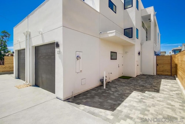 view of home's exterior with a garage