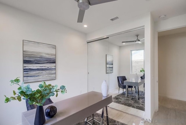 office area featuring ceiling fan and wood-type flooring