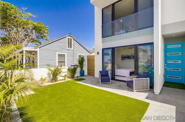 exterior space featuring a patio area and a yard