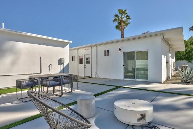 back of house featuring a patio area