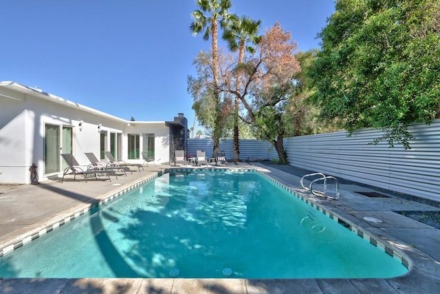 view of pool with a patio