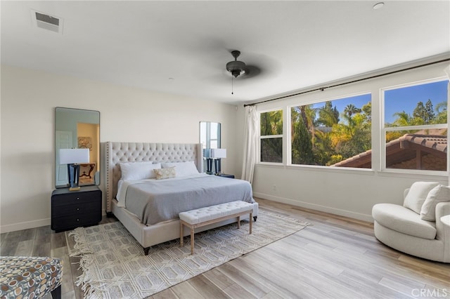 bedroom featuring ceiling fan and hardwood / wood-style floors