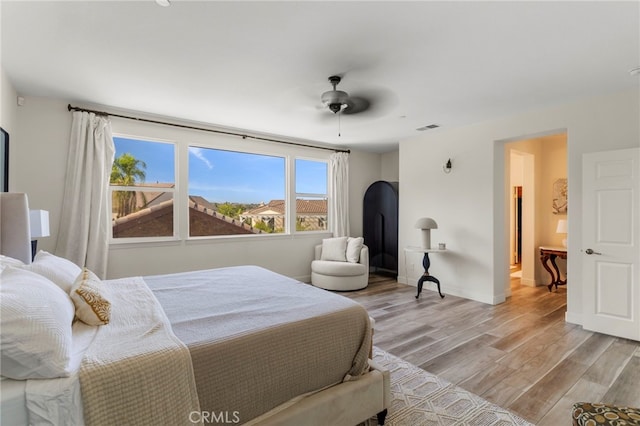 bedroom featuring ceiling fan and light hardwood / wood-style floors