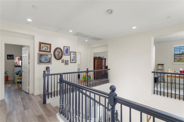 hallway featuring light wood-type flooring