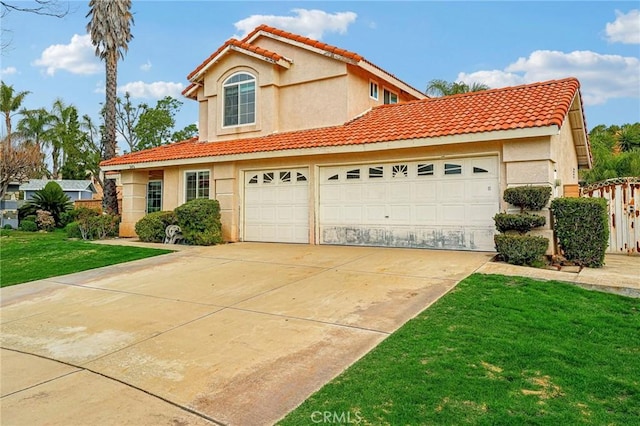 mediterranean / spanish-style house featuring a front lawn