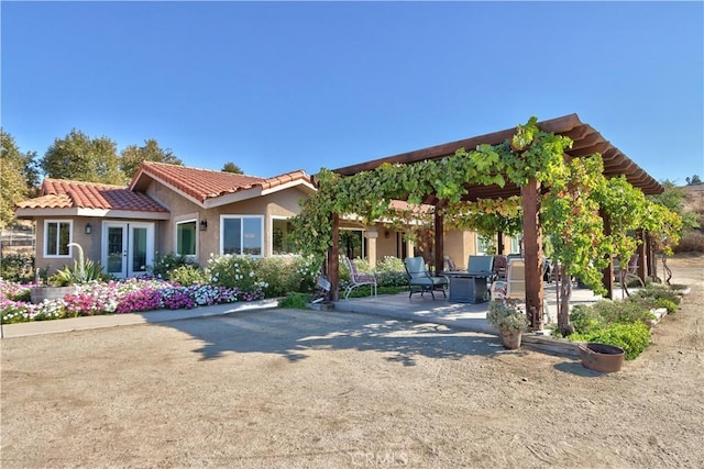 view of front of home with a patio