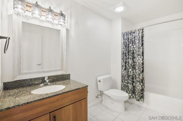 full bathroom featuring toilet, vanity, tile patterned flooring, and shower / tub combo