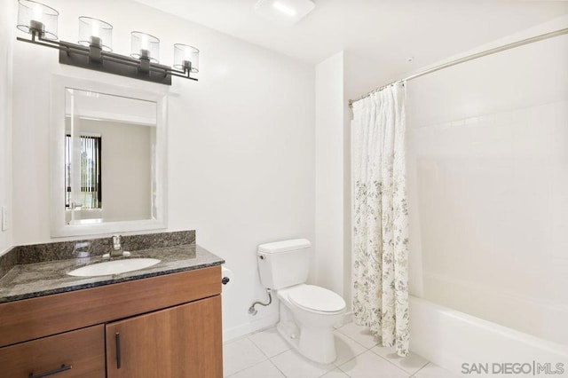 full bathroom with toilet, vanity, tile patterned floors, and shower / bathtub combination with curtain