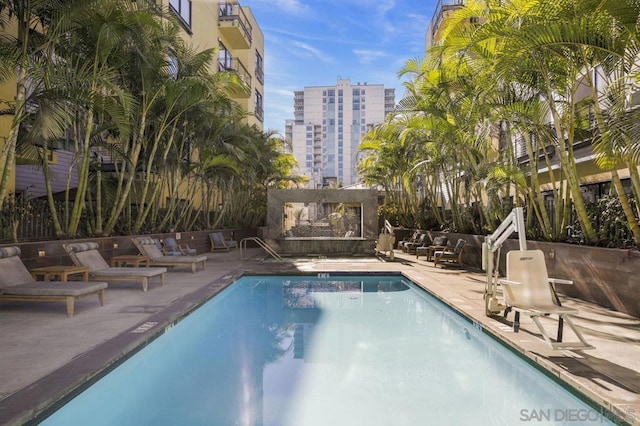 view of swimming pool featuring a patio