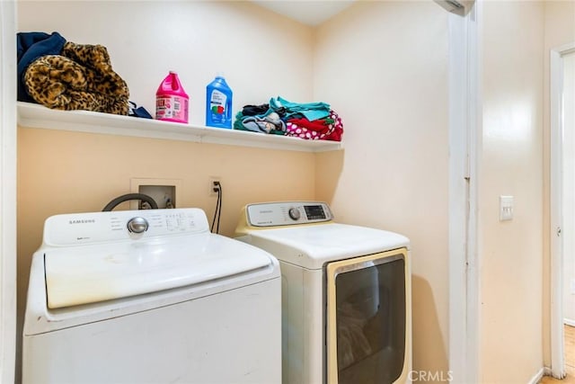 laundry room featuring independent washer and dryer