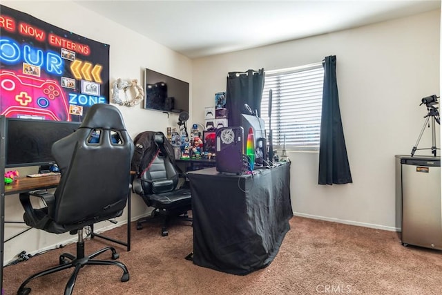 carpeted office featuring water heater