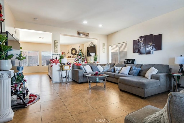 living room with light tile patterned floors