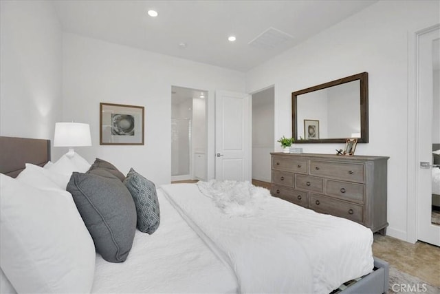 bedroom featuring connected bathroom