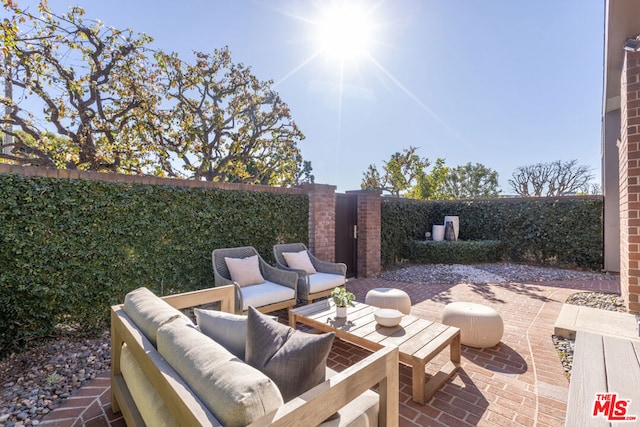 view of patio / terrace with an outdoor hangout area