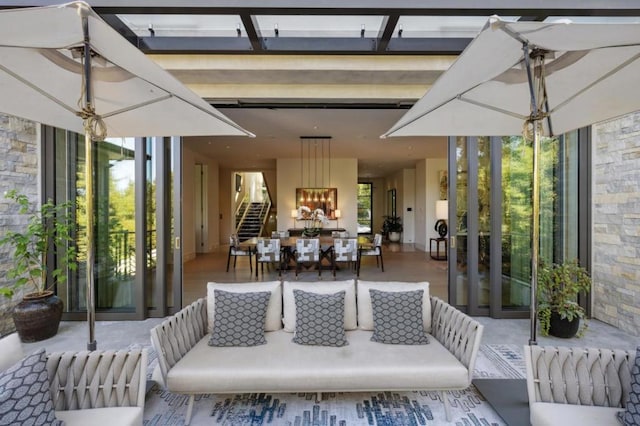 view of patio featuring a pergola and outdoor lounge area