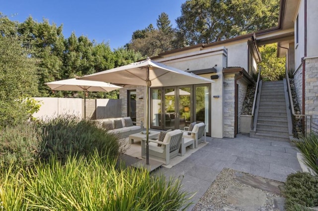 view of patio featuring french doors and an outdoor hangout area