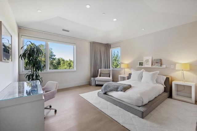 bedroom with light hardwood / wood-style flooring