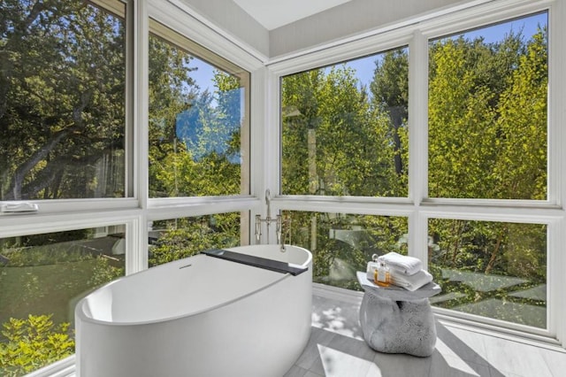 sunroom featuring plenty of natural light