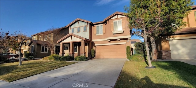 craftsman-style house featuring a garage and a front yard