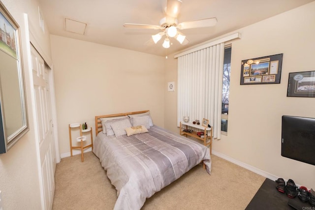 carpeted bedroom featuring ceiling fan