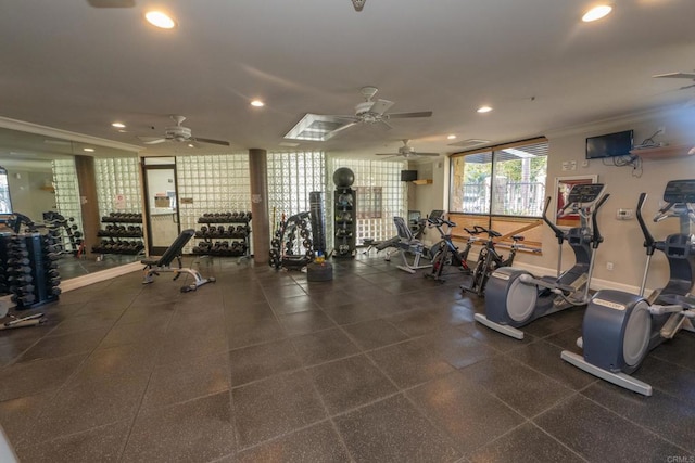 workout area featuring ceiling fan and crown molding