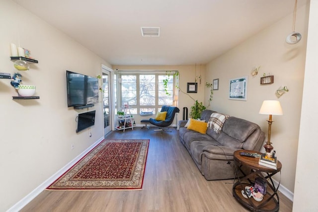 living room featuring light wood-type flooring