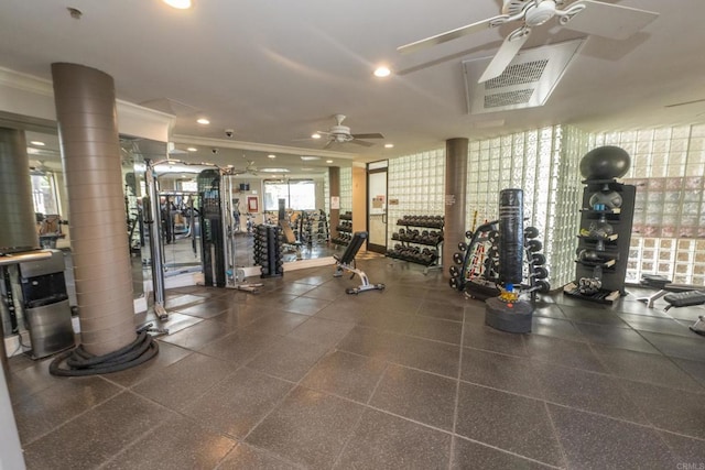 workout area featuring crown molding and ceiling fan