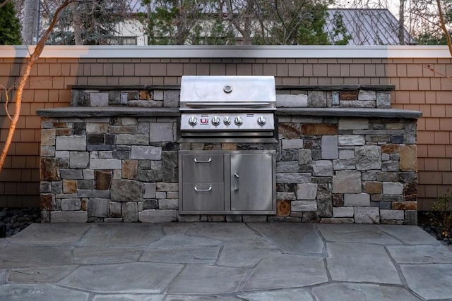 view of patio / terrace with a grill and exterior kitchen