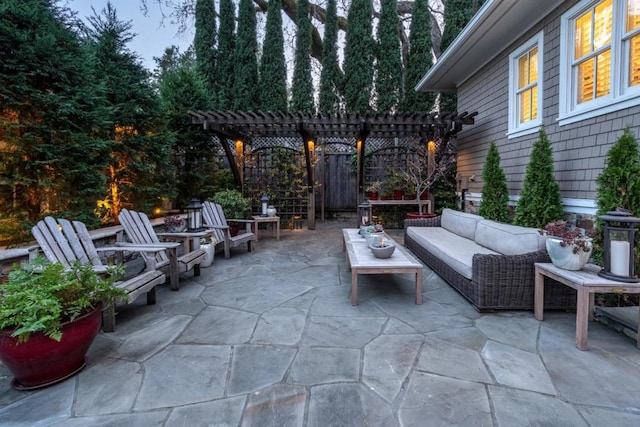 view of patio featuring an outdoor hangout area and a pergola