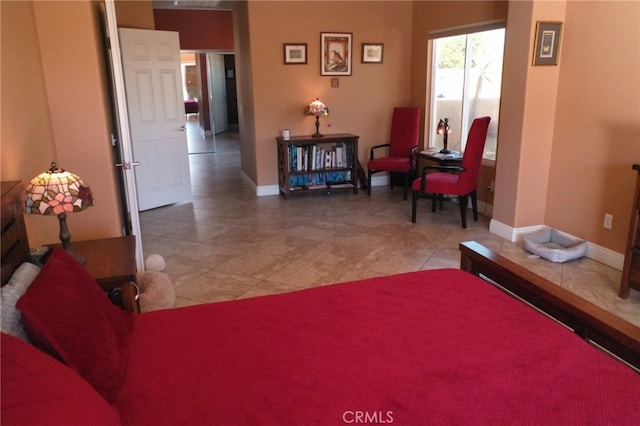 sitting room featuring tile patterned floors