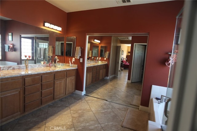 bathroom featuring vanity and tile patterned floors