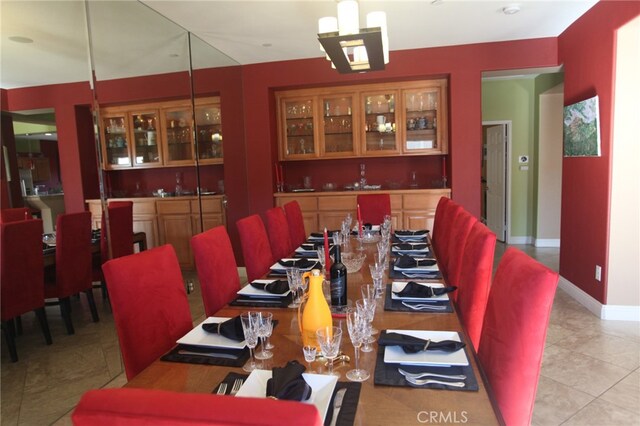 tiled dining room with bar area