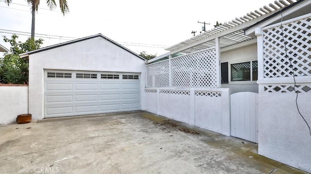 detached garage with fence