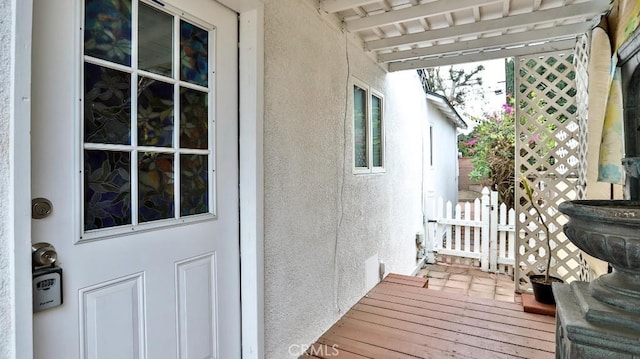 exterior space featuring stucco siding