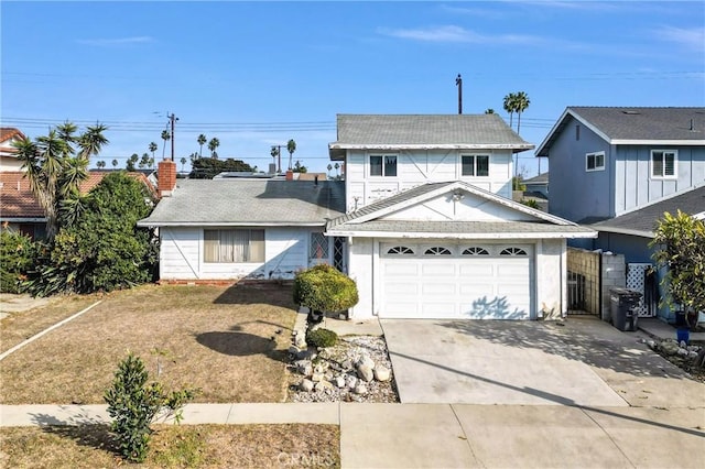 front of property with a garage