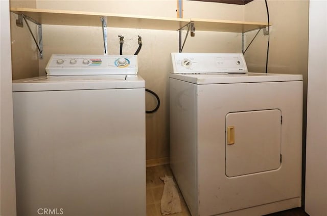 laundry area with washer and clothes dryer