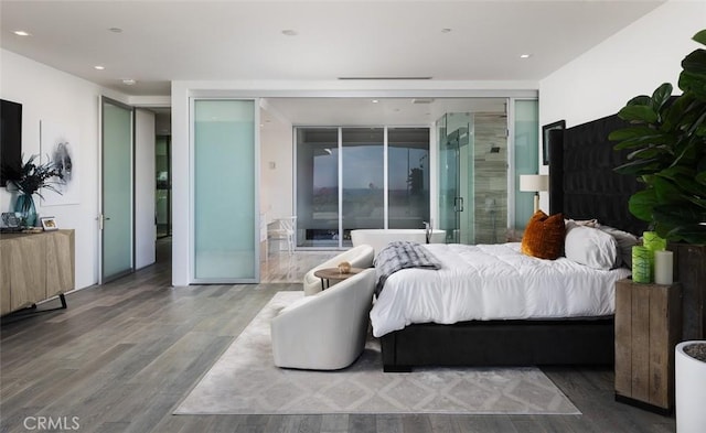 bedroom with wood-type flooring