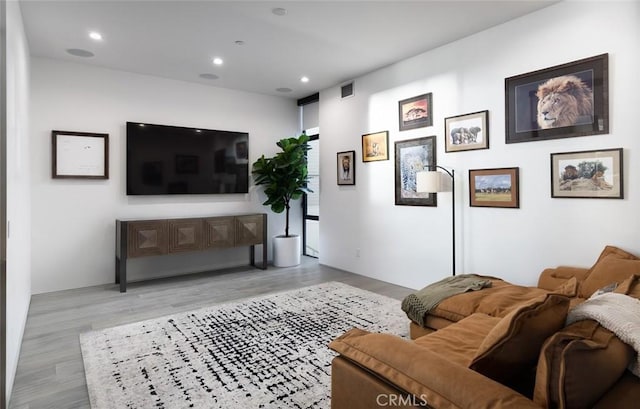 living room featuring light wood-type flooring