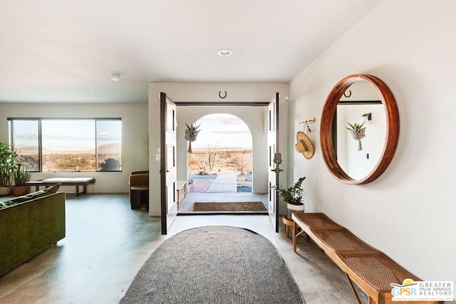 entryway featuring concrete floors