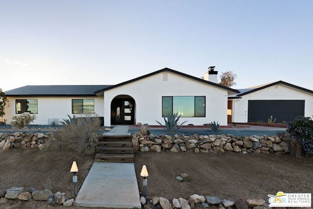 view of front of house with a garage