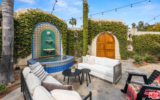 view of patio featuring an outdoor hangout area