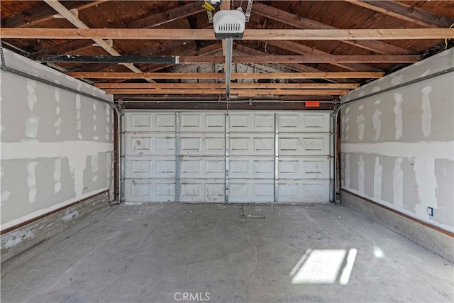 garage featuring a garage door opener