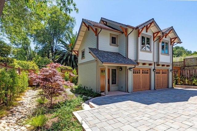 view of front of home with a garage