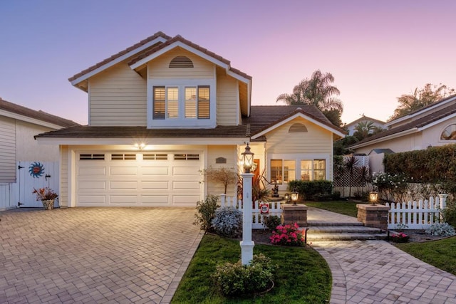 front facade with a garage