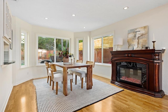 dining area featuring light wood-type flooring