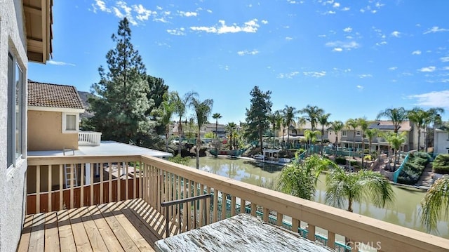 balcony featuring a water view