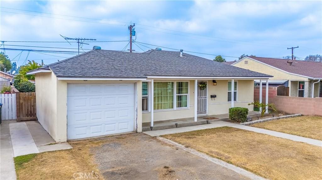 ranch-style home with a garage