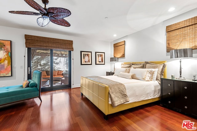 bedroom with ceiling fan, access to exterior, and dark wood-type flooring