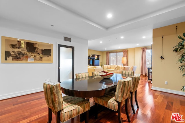 dining room featuring wood-type flooring