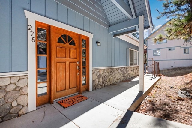 property entrance featuring covered porch